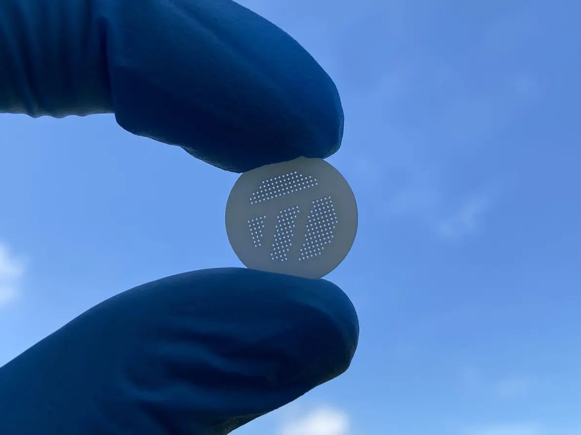 Aluminum nitride part with dense hole array