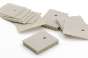 AlN ceramic spacers with tooling hole